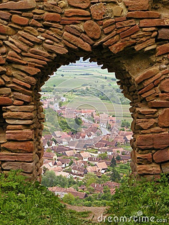 Town view through old citadel gate Stock Photo