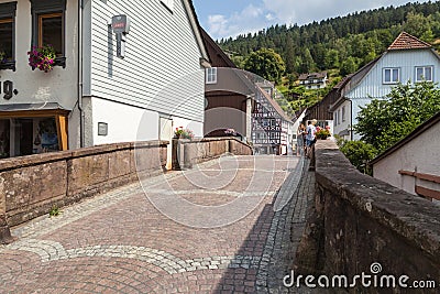 Townscape with a historic bridge in Alpirsbach Editorial Stock Photo