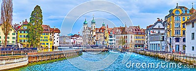 The townscape of medieval Lucerne with Needle Dam and Jesuit Church on background, Switzerland Stock Photo
