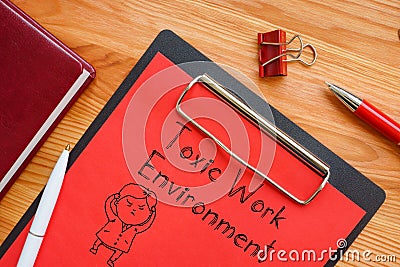 Toxic Work Environment is shown on the business photo using the text Stock Photo