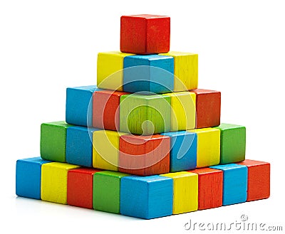 Toy blocks pyramid, multicolor wooden bricks stack Stock Photo