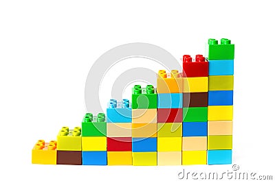Toy bricks shape as a growing trend on white Stock Photo