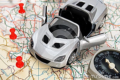 Toy car on a geographical atlas Stock Photo