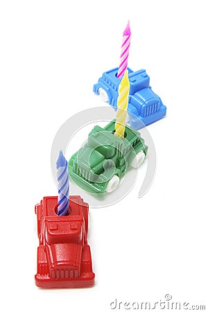 Toy Cars with Birthday Candle Stock Photo