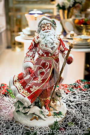 Toy christmas decor and decorations for home. merry santa dancing and spinning in the dance. macro photo. Stock Photo