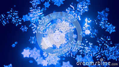 Toy Christmas blue snowflakes covered with sparkles in the air glisten in the light with shallow depth of field giving a Stock Photo