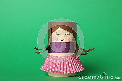 Toy doll made of toilet paper hub on background Stock Photo