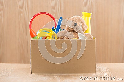 Toy. Donation box with unwanted items for poor Stock Photo