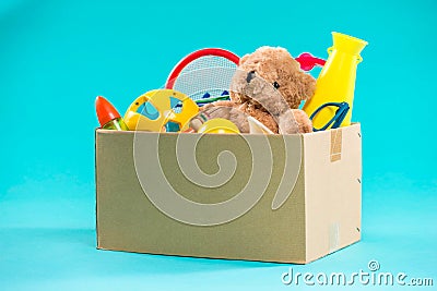 Toy. Donation box with unwanted items for poor Stock Photo