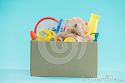 Toy. Donation box with unwanted items for poor Stock Photo