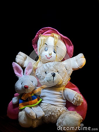 Toy family of three fun loved colour full soft toy played by small kids and childrens Stock Photo
