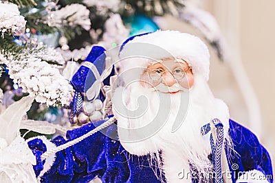 Toy figure of Santa Claus and reindeer and elves as Christmas decorations Stock Photo