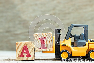 Toy forklift hold letter block I to word AI Abbreviation of artificial intelligence on wood background Stock Photo