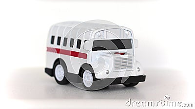 Toy in the form of a medical ambulance on a white background Editorial Stock Photo