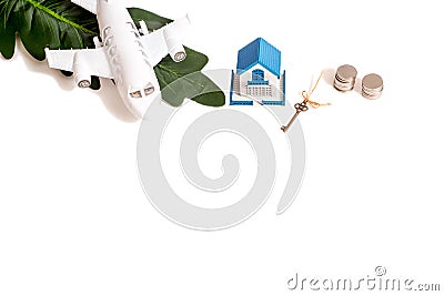 Toy house, penny money, white plane. Business and success concept on white background. isolated Copy space Stock Photo