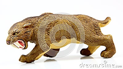 Toy saber-toothed tiger Stock Photo