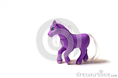 Toy small purple horse pony figurine isolated Stock Photo