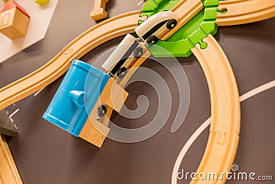 Toy Train in brick town.wooden trains in indoor playground or amusement center.Kindergarten or preschool play room.Toys Stock Photo