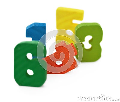 Toy wooden color ciphers, on white Stock Photo