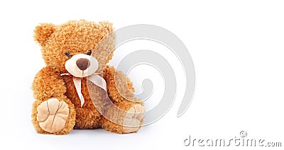 Toys - Baby teddy bear sits on white Stock Photo