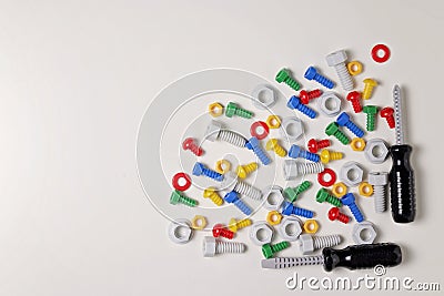 Toys background. Kids construction tools frame on white background. Top view. Flat lay. Stock Photo