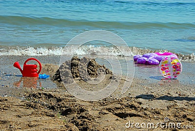 Toys on the beach Stock Photo