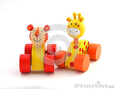 Toys for children. Wooden animal figures on wheels. Stock Photo