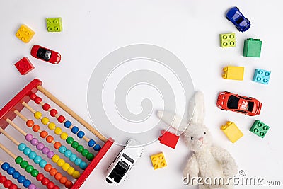 Toys constuctor and cars, top view on white background, place for text Stock Photo