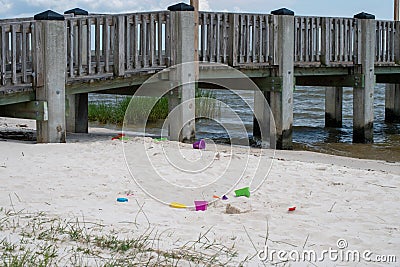 Toys left behind near the Mississippi pier. Stock Photo