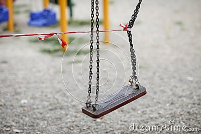 Toys from a playground in a park are being off limits due to the Covid-19 outbreak Editorial Stock Photo