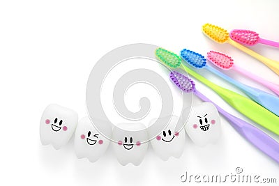 Toys teeth dental in a smiling mood with tooth brush Stock Photo