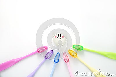 Toys teeth dental in a smiling mood with tooth brush Stock Photo