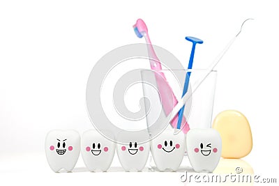 Toys teeth in a smiling mood isolated on a white background Stock Photo