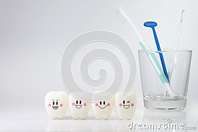 Toys teeth in a smiling mood on a white background Stock Photo