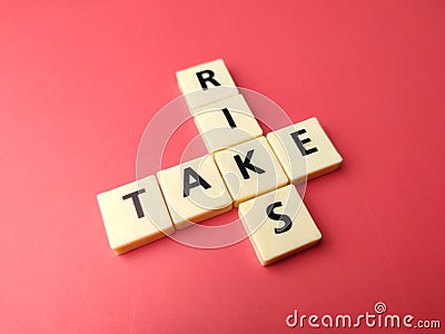 oys word with the word TAKE RISK Stock Photo