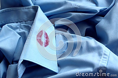 Traces of lipstick on the collar of a man`s shirt Stock Photo