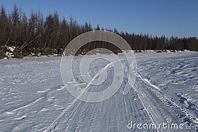 Traces of a vehicle in the snow. Stock Photo