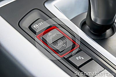 Track control buttons near automatic gear stick of a modern car, car interior details. Stock Photo