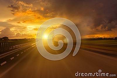 Track in motion blur on rvrning highway Stock Photo