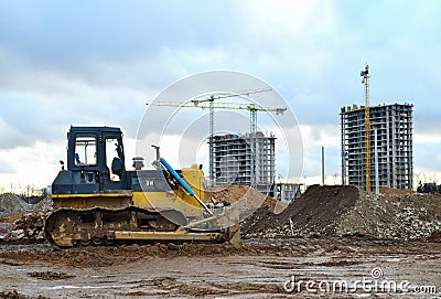 Track-type bulldozer during of large construction jobs at building site. Editorial Stock Photo