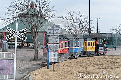 Kid trackless train ride in public winter event in Irving, Texas Editorial Stock Photo