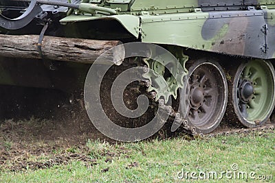 Tracks and wheels of the military tank Stock Photo