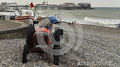 Tractor and Crab Fishing Boats, Cromer, Norfolk, England, UK Editorial Stock Photo