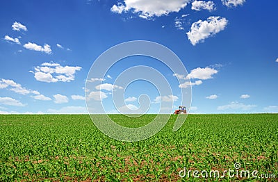 Tractor cultivating 3 Stock Photo