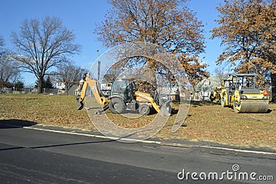 Tractor equipment located on the side of road Editorial Stock Photo