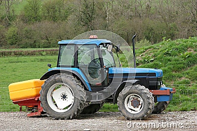 Tractor and Fertiliser Spreader Stock Photo