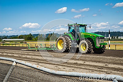 Tractor on horse race track Editorial Stock Photo