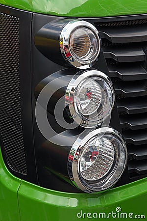 Tractor lights and grille closeup Stock Photo