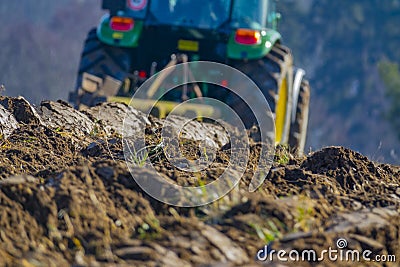 Tractor with plough plow close up Editorial Stock Photo