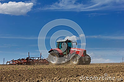 Tractor and Plow Stock Photo